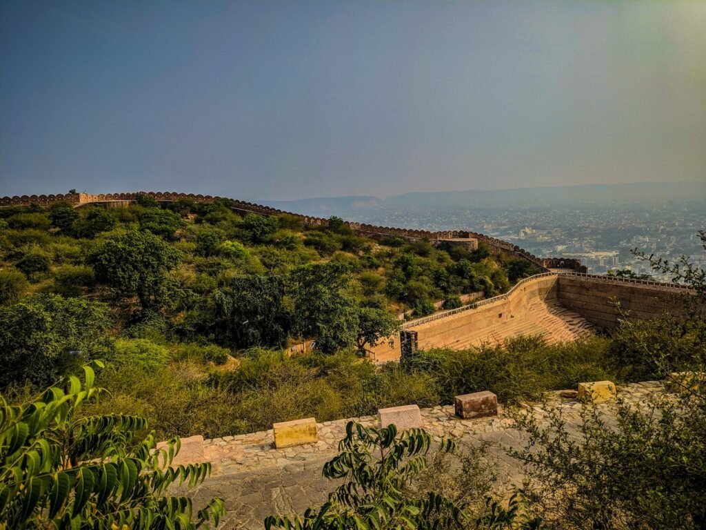 brown concrete houses near body of water during daytime